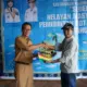 Pemkot Bandar Lampung Bagikan Kartu Asuransi Nelayan di Acara Sedekah Laut