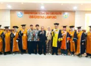 Kepala Disdukcapil Tulang Bawang Raih Gelar Doktor di Unila, Bupati Qudrotul Harap Ilmunya Bermanfaat bagi Daerah